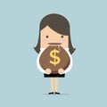 Businesswoman slipping on a banana peel and falling down.Businesswoman holding a money bag with dollar sign. Royalty Free Stock Photo