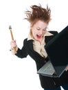 Businesswoman smashing laptop with a hammer Royalty Free Stock Photo