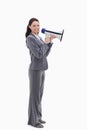 A businesswoman smiling with a megaphone Royalty Free Stock Photo