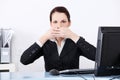 Businesswoman in the speak no evil pose. Royalty Free Stock Photo