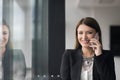 Business Girl Standing In A Modern Building Near The Window With