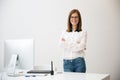 Businesswoman standing with arms folded Royalty Free Stock Photo