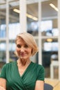 Businesswoman standing in the corridor at office Royalty Free Stock Photo