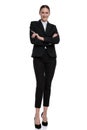 Businesswoman standing with crossed hands confident Royalty Free Stock Photo