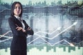 Businesswoman standing on a financial chart with up arrows and world map background, double exposure Royalty Free Stock Photo