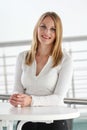 Businesswoman standing in a modern Building