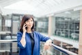 Excited Senior Business Lady Talking on Phone Royalty Free Stock Photo