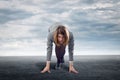 Businesswoman standing in start position