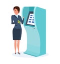 Businesswoman stands next to terminal, to transfer funds to card. Royalty Free Stock Photo