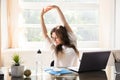 Businesswoman Stretching Her Arms Royalty Free Stock Photo