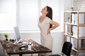 Businesswoman Suffering From Back Pain Royalty Free Stock Photo