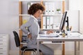 Businesswoman Suffering From Back Pain Royalty Free Stock Photo