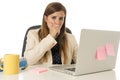 Businesswoman suffering stress at office computer desk looking worried depressed and overwhelmed Royalty Free Stock Photo