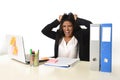 Businesswoman suffering stress working at office computer desk worried desperate Royalty Free Stock Photo