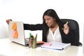 Businesswoman suffering stress working at office computer desk worried desperate Royalty Free Stock Photo