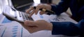 Businesswoman on suit Hand holding pen and press calculator button on the desk with paperwork at workplace office. Banner-wide Royalty Free Stock Photo