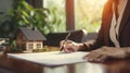 Businesswoman in a suit signing a home loan contract. AI Generated