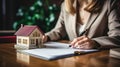 Businesswoman in a suit signing a home loan contract. AI Generated