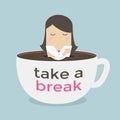 Businesswoman take a break in a coffee cup.