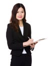 Businesswoman take note on clipboard Royalty Free Stock Photo
