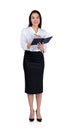 Businesswoman take note in notebook. Isolated over white background Royalty Free Stock Photo