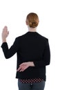 Businesswoman taking oath with fingers crossed Royalty Free Stock Photo