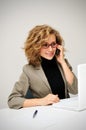 Businesswoman taking telephone call Royalty Free Stock Photo