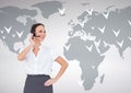 Businesswoman talking on headset with world map in background Royalty Free Stock Photo