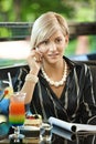 Businesswoman talking on mobile in cafe Royalty Free Stock Photo