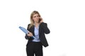 Businesswoman talking on mobile phone holding office folder and pen looking busy and worried Royalty Free Stock Photo