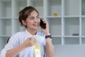 Businesswoman is talking on mobile phone in working office. beautiful of Asian woman is calling to someone on cell phone Royalty Free Stock Photo