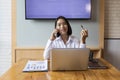 Businesswoman talking on the phone and smiling. Secretary answering her cellphone