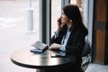 businesswoman talking on the phone and taking notes Royalty Free Stock Photo