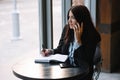 businesswoman talking on the phone and taking notes Royalty Free Stock Photo