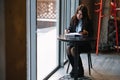 businesswoman talking on the phone and taking notes Royalty Free Stock Photo