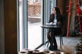 businesswoman talking on the phone and taking notes Royalty Free Stock Photo