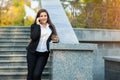 Businesswoman talking on phone while walking outdoor Royalty Free Stock Photo