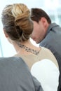 Businesswoman with tatoo in work meeting