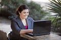 Businesswoman - Telecommuting from Internet Cafe Royalty Free Stock Photo