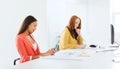 Businesswoman texting on smartphone at office Royalty Free Stock Photo