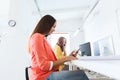 Businesswoman texting on smartphone at office Royalty Free Stock Photo