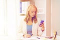 Businesswoman texting on smartphone at office Royalty Free Stock Photo