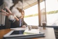 Businesswoman tired feels sitting at office desk with laptop and crumpled paper. woman can not concentrate and fail having work Royalty Free Stock Photo