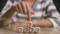 Businesswoman touching wooden arranging cube with question mark icon. Q and A concept. frequently asked questions concepts in Royalty Free Stock Photo