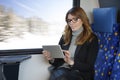 Businesswoman on train Royalty Free Stock Photo