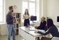 Businesswoman training speaker give presentation at company meeting. Business woman in boardroom Royalty Free Stock Photo