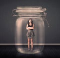 Businesswoman trapped into a glass jar concept