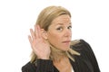 Businesswoman tries to listen Royalty Free Stock Photo