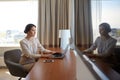 Businesswoman typing on laptop at hotel room Royalty Free Stock Photo