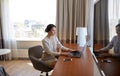 Businesswoman typing on laptop at hotel room Royalty Free Stock Photo